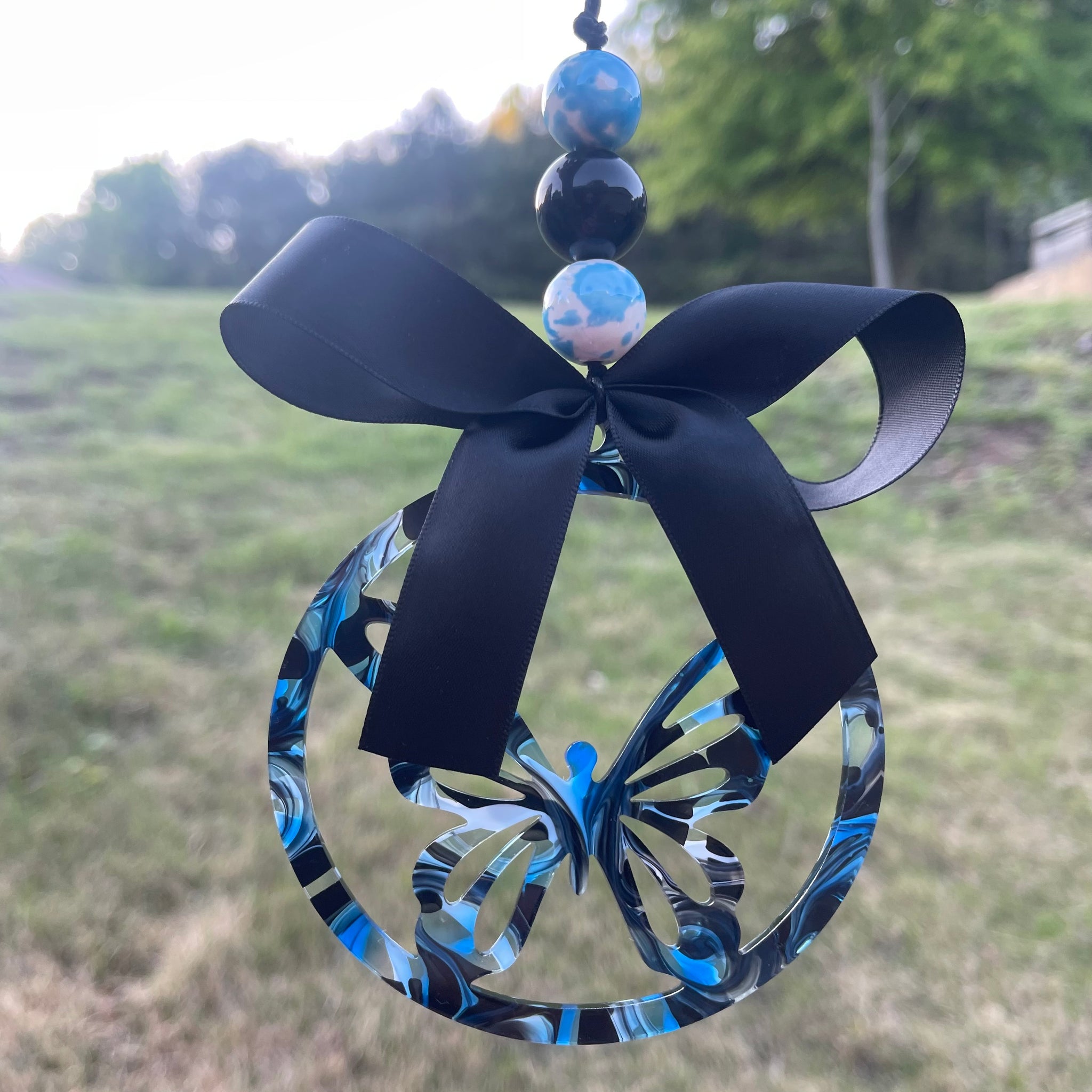 Butterfly: Black On Bluebonnet Swirls Car Charm